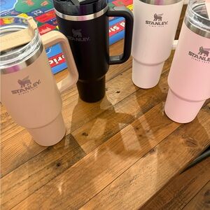 Stanley Water Bottles in Black, Cream, and White